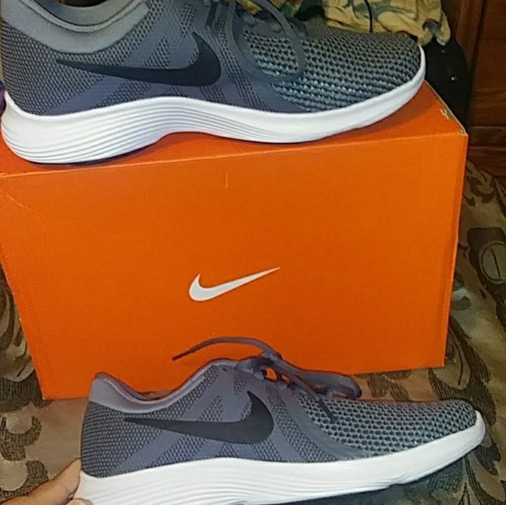 Brand new Nike Revolution 4 men shoes size 8